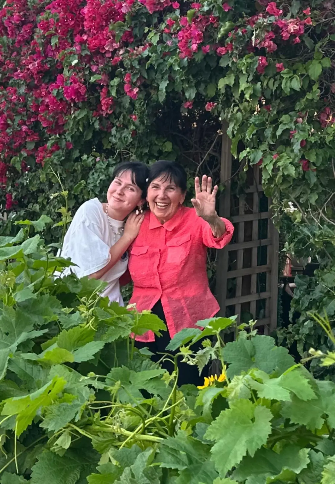 A joyful family moment in the garden with the woman who inspired Forever Young